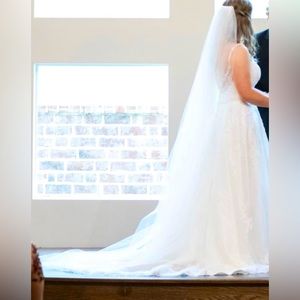 Like new cathedral custom made white wedding veil.
